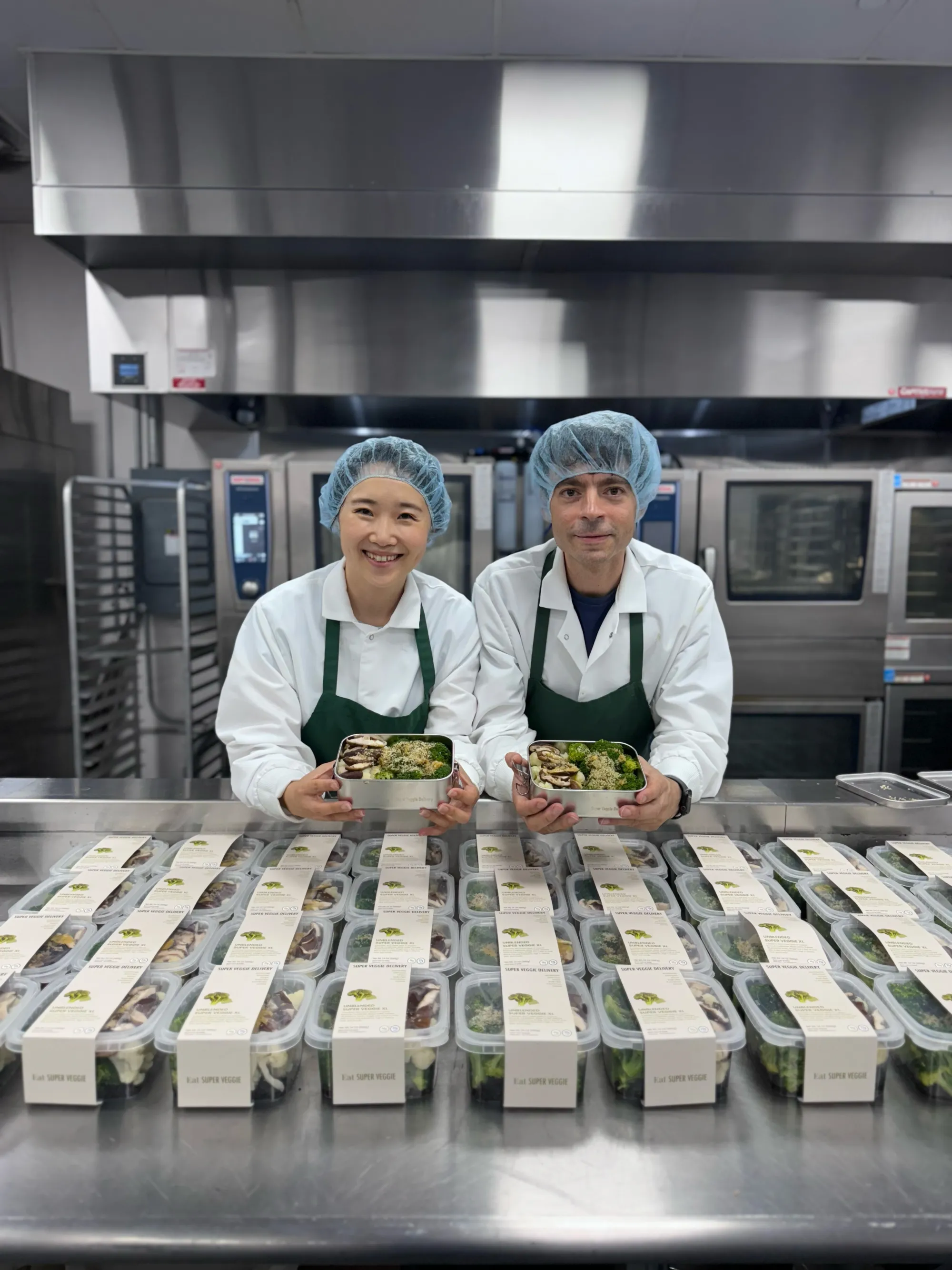 Kerry and Nick, founders of Super Veggie Delivery, in their factory