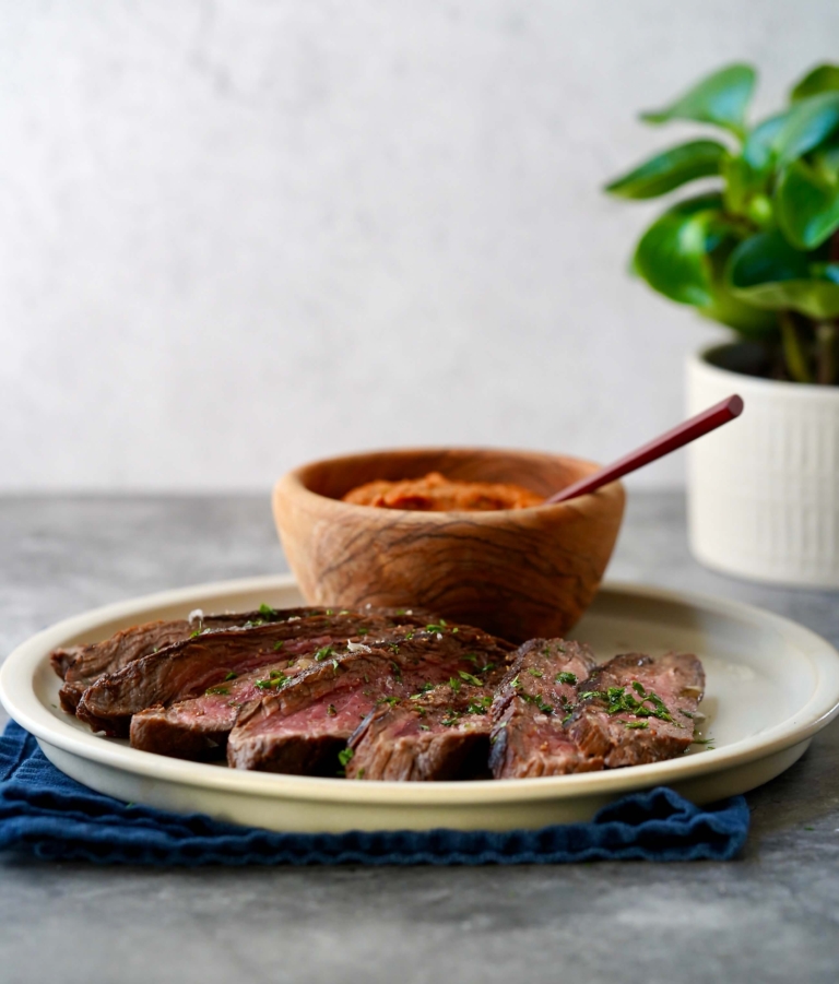 Bitter Greens with Steak and Romesco Sauce