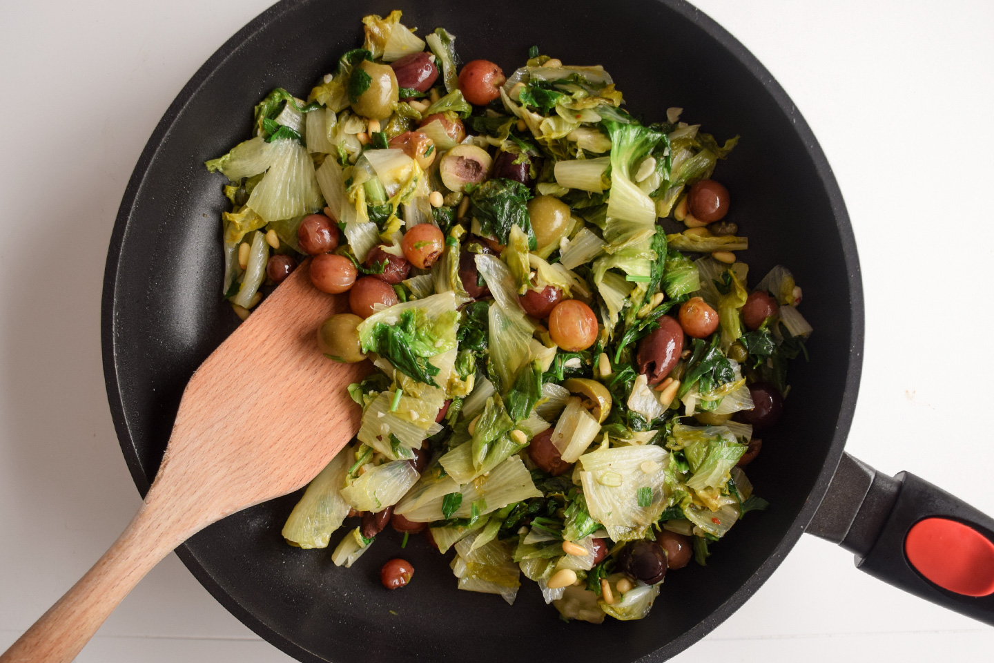 Escarole, olives, tomatoes, and basil