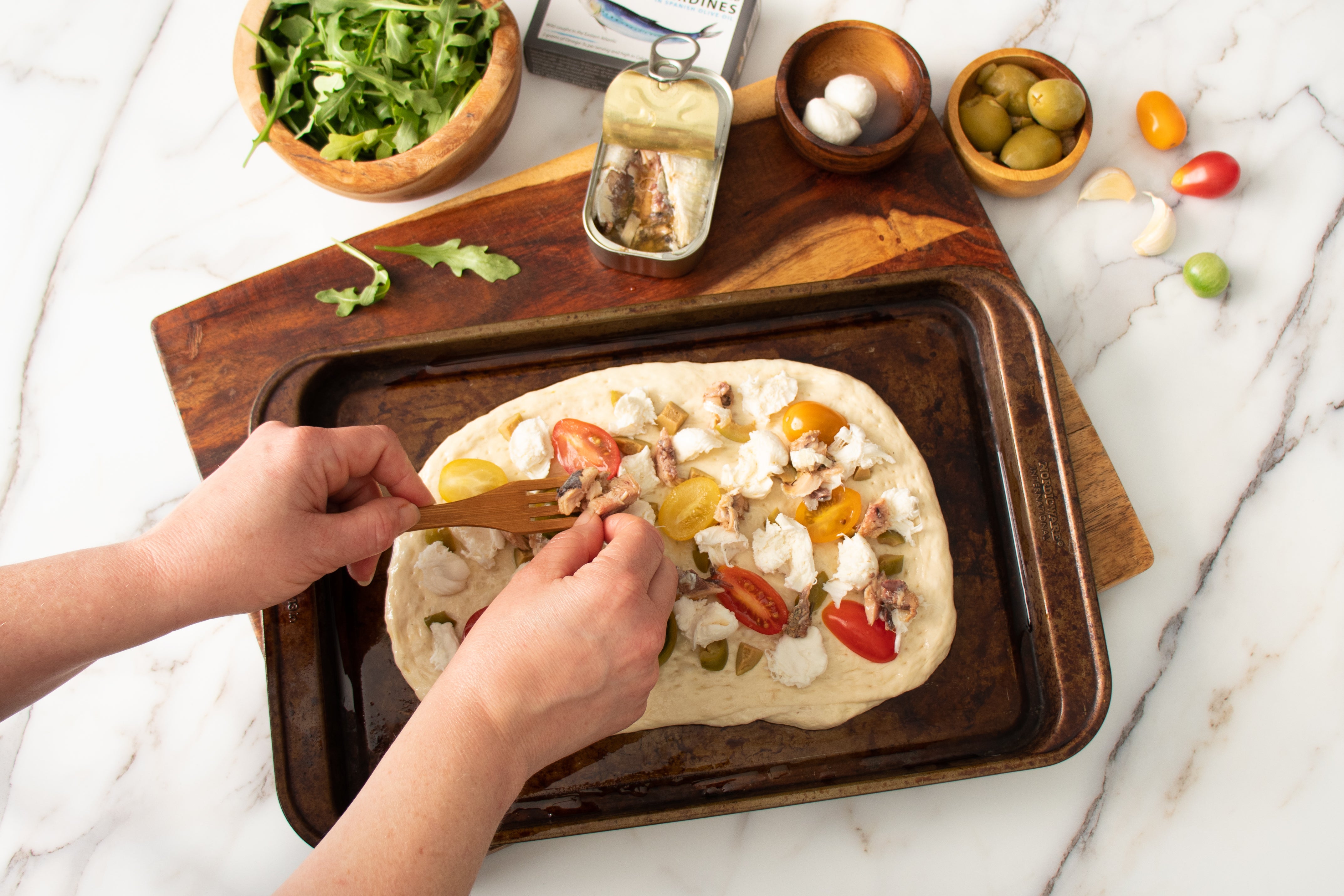 Pizza with vegetables, anchovies, and sardines (no cheese)