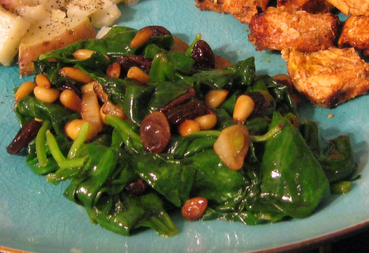 Spinach with pine nuts and raisins